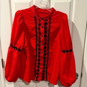Chic Red Blouse with Black Floral Details